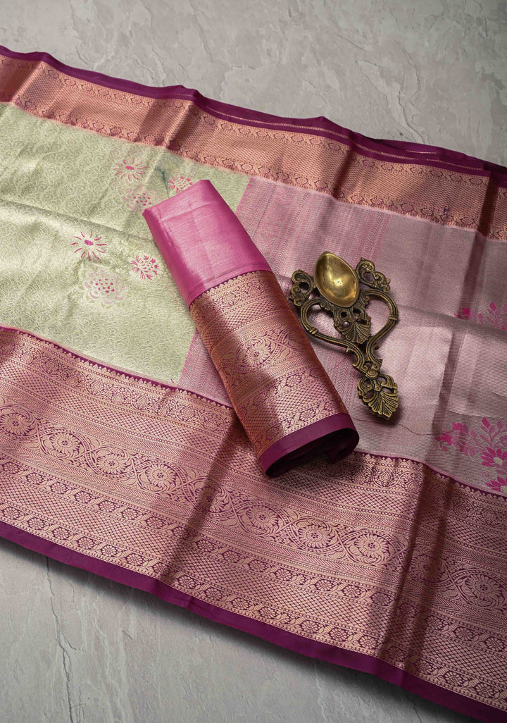 Pale Green Brocade Jaal on Kanjivaram Tissue Semi Silk Saree with Meenakari Buttas and Contrast Zari Border