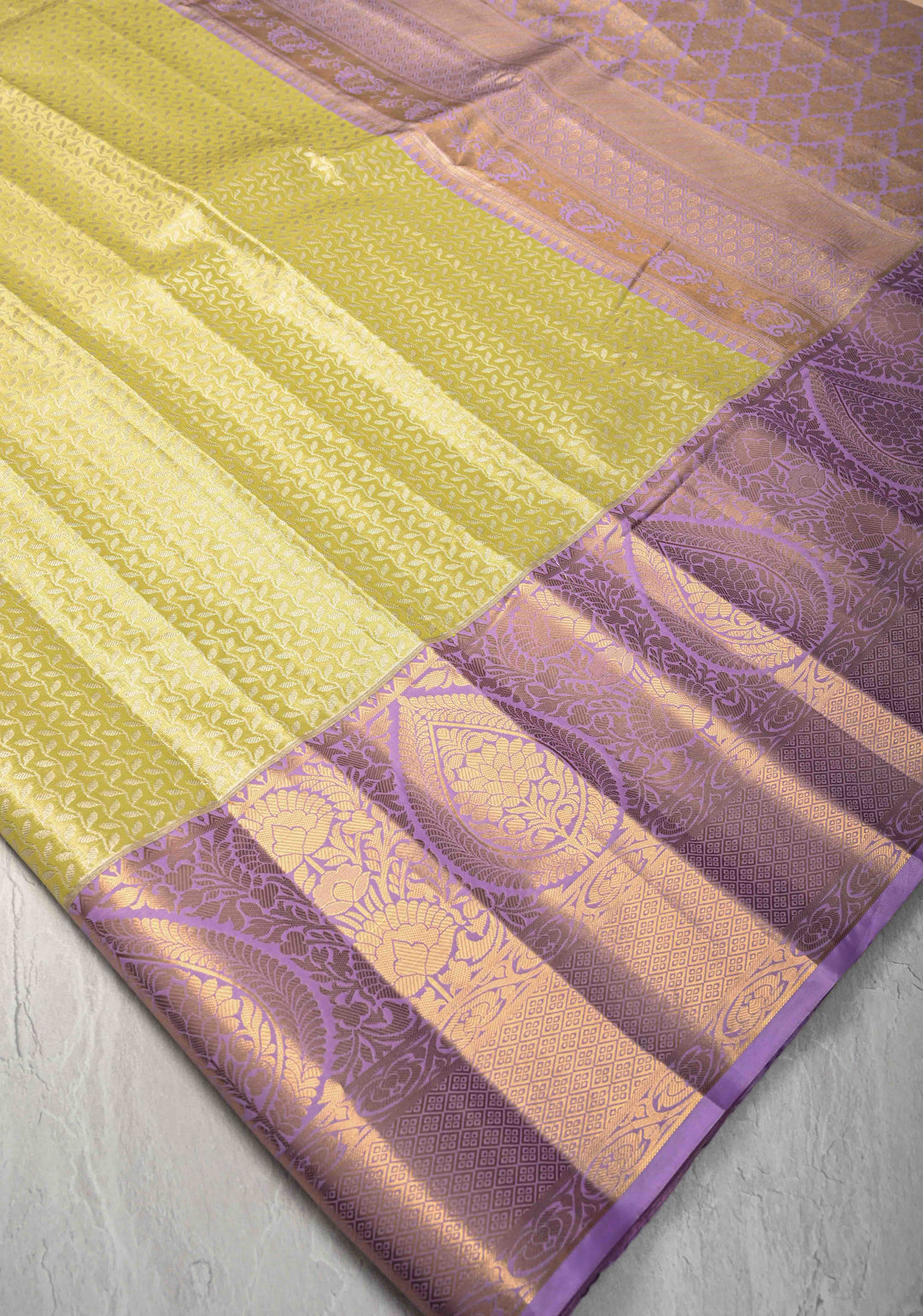 Moss Green Kanjivaram Tissue Semi Silk Saree with Floral Vines Stripes Brocade and Contrast Wide Zari Border