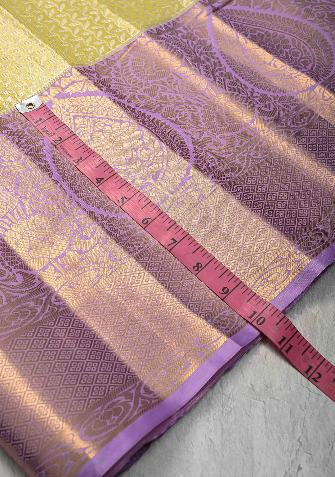 Moss Green Kanjivaram Tissue Semi Silk Saree with Floral Vines Stripes Brocade and Contrast Wide Zari Border