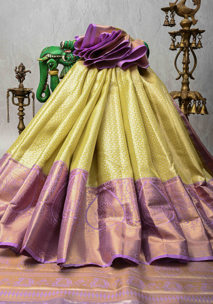 Moss Green Kanjivaram Tissue Semi Silk Saree with Floral Vines Stripes Brocade and Contrast Wide Zari Border