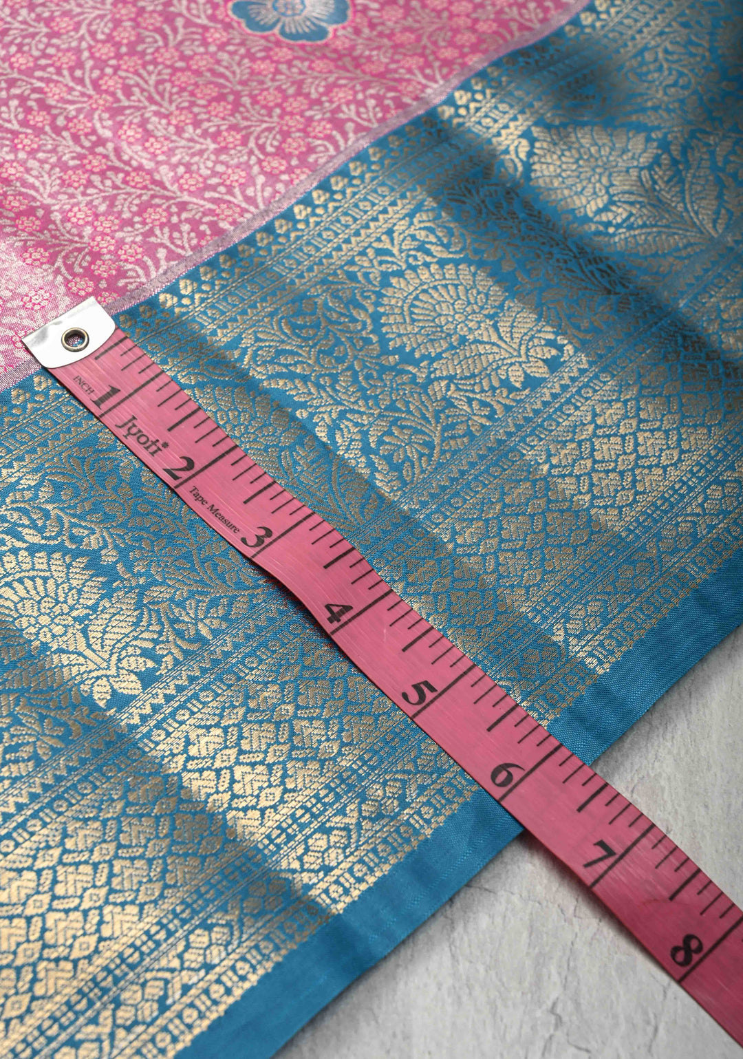 Dark Pink Brocade Jaal on Kanjivaram Tissue Semi Silk Saree with Meenakari Buttas and Contrast Zari Border