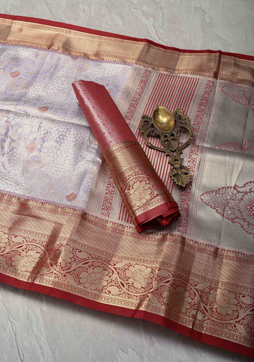 Light Lavender Brocade on Kanjivaram Tissue Semi Silk Saree with Meenakari Buttas and Contrast Zari Border