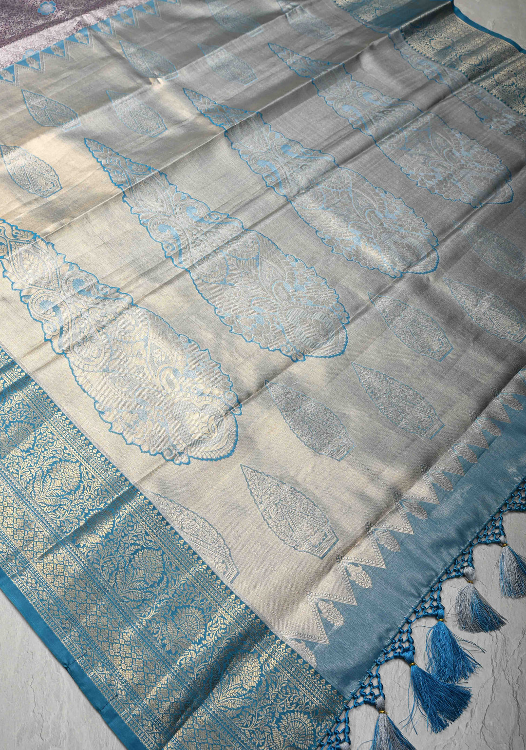 Purple Taupe Brocade Jaal on Kanjivaram Tissue Semi Silk Saree with Meenakari Buttas and Contrast Zari Border