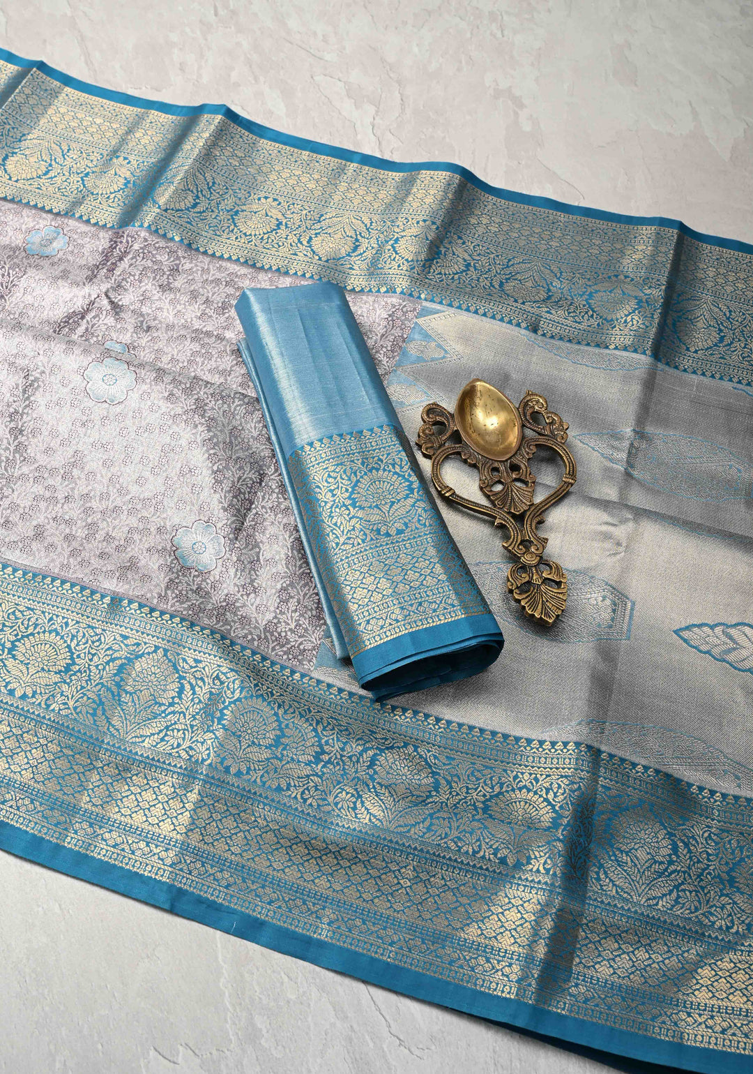 Purple Taupe Brocade Jaal on Kanjivaram Tissue Semi Silk Saree with Meenakari Buttas and Contrast Zari Border