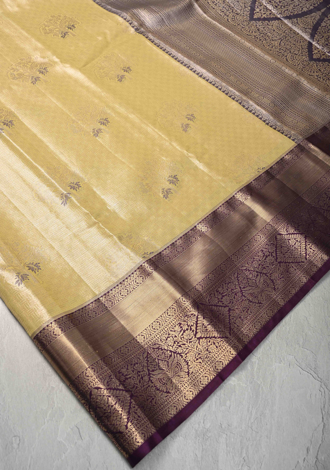 Pale Yellow Brocade on Kanjivaram Tissue Semi Silk Saree with Meenakari Buttas and Contrast Zari Border