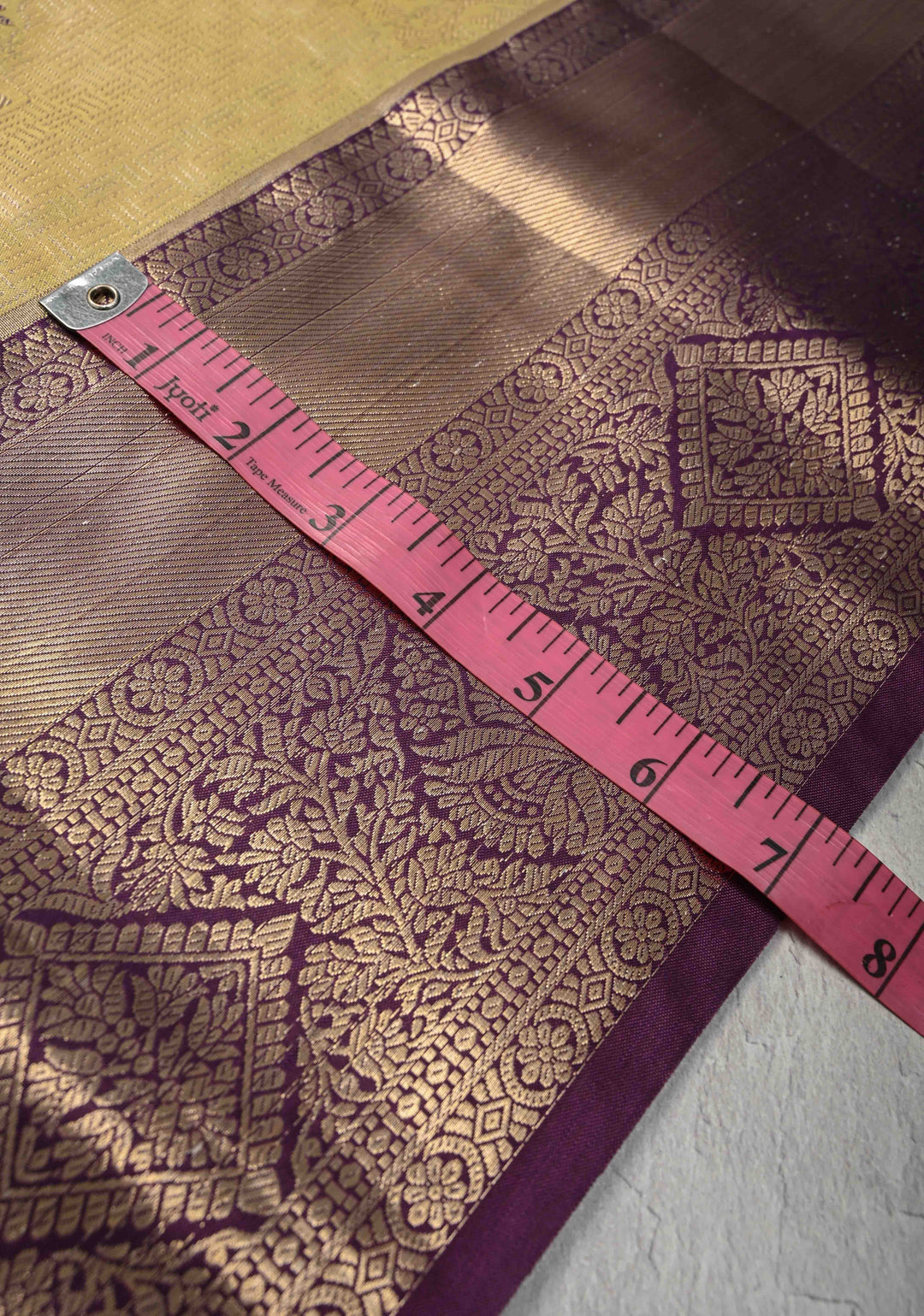 Pale Yellow Brocade on Kanjivaram Tissue Semi Silk Saree with Meenakari Buttas and Contrast Zari Border
