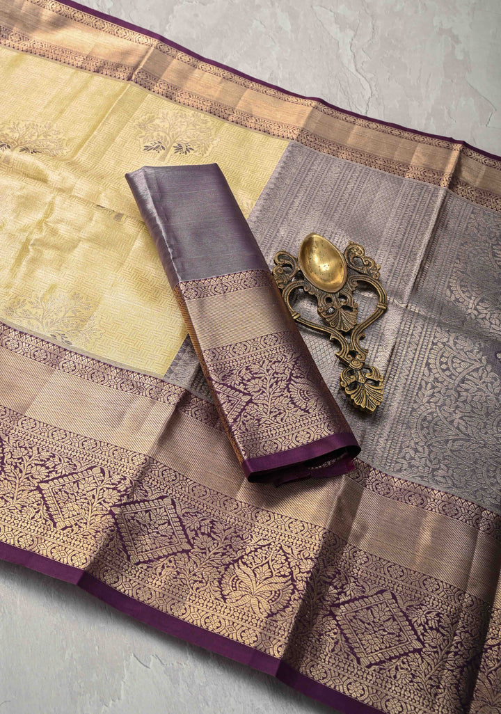 Pale Yellow Brocade on Kanjivaram Tissue Semi Silk Saree with Meenakari Buttas and Contrast Zari Border