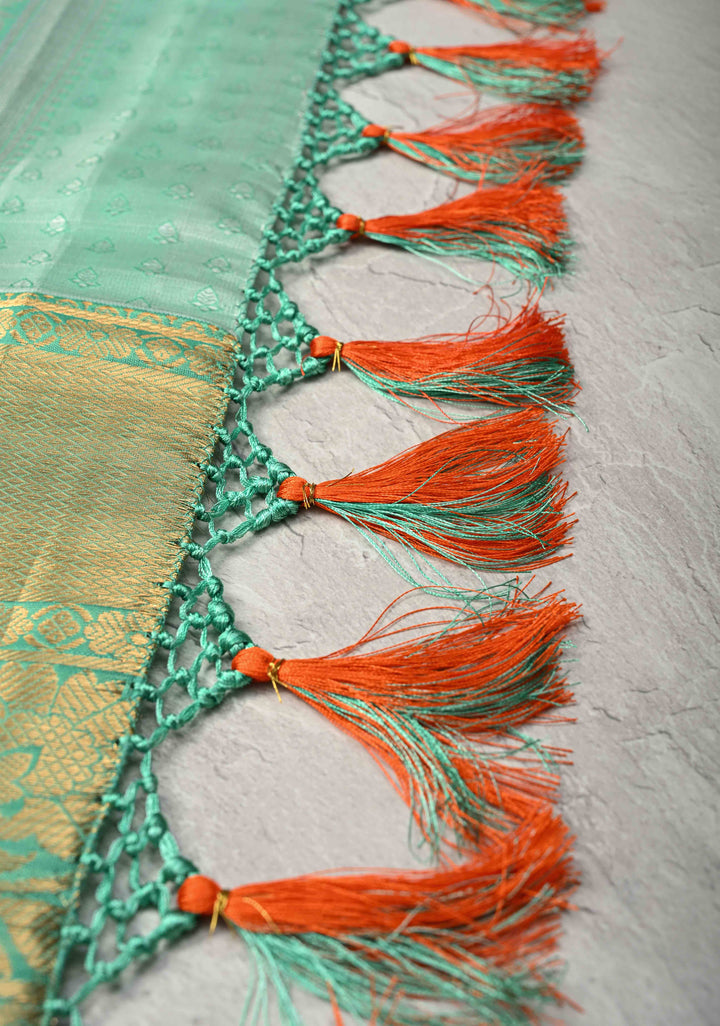 Coral Orange Kanjivaram Tissue Semi Silk Saree with Meenakari Brocade Jaal and Contrast Wide Zari Border
