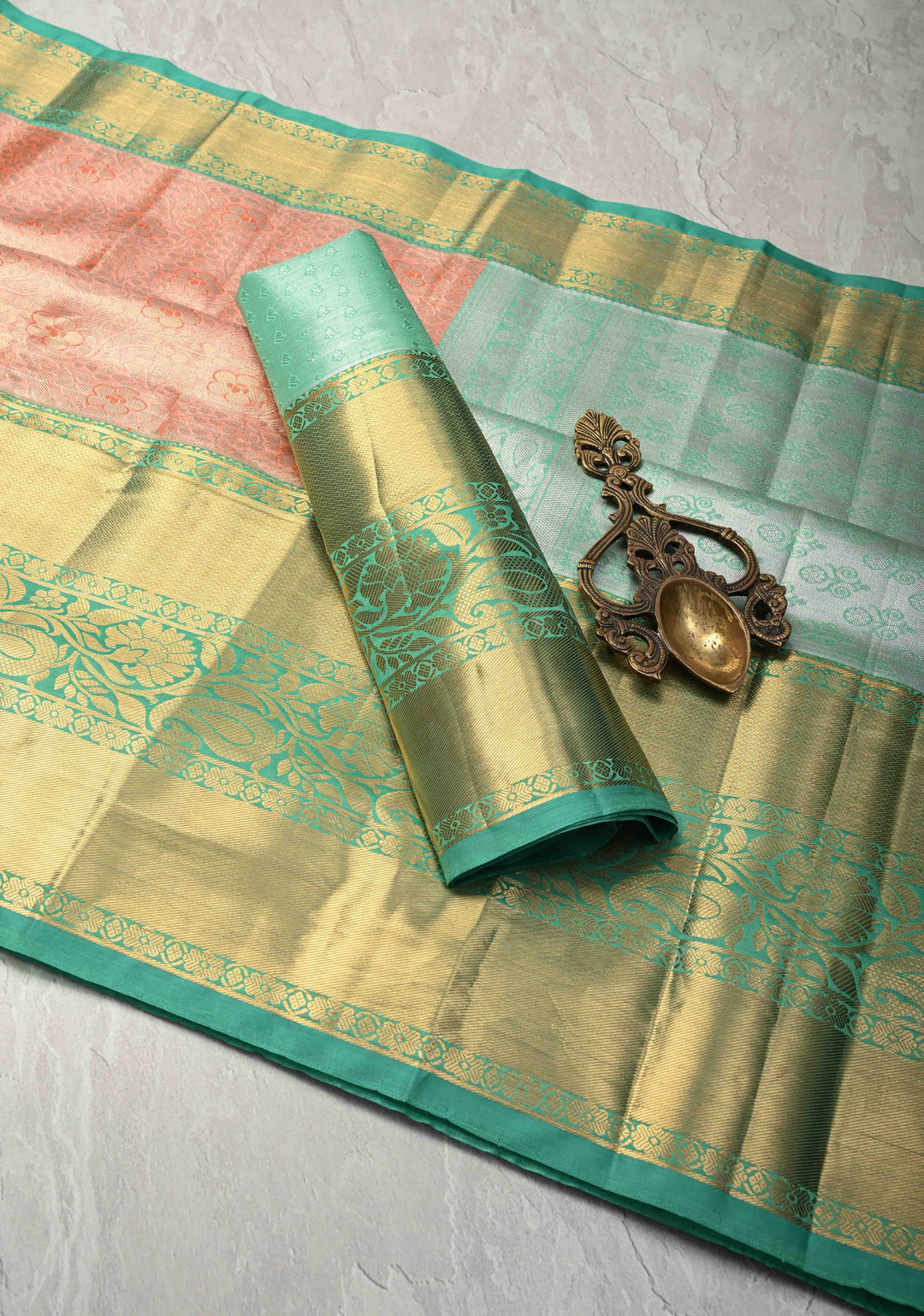 Coral Orange Kanjivaram Tissue Semi Silk Saree with Meenakari Brocade Jaal and Contrast Wide Zari Border