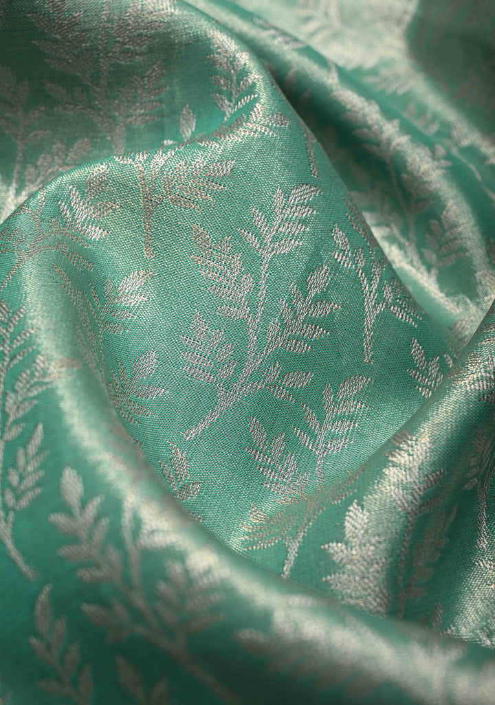 Seafoam Green Kanjivaram Tissue Semi Silk Saree with Floral Brocade and Contrast Zari Border