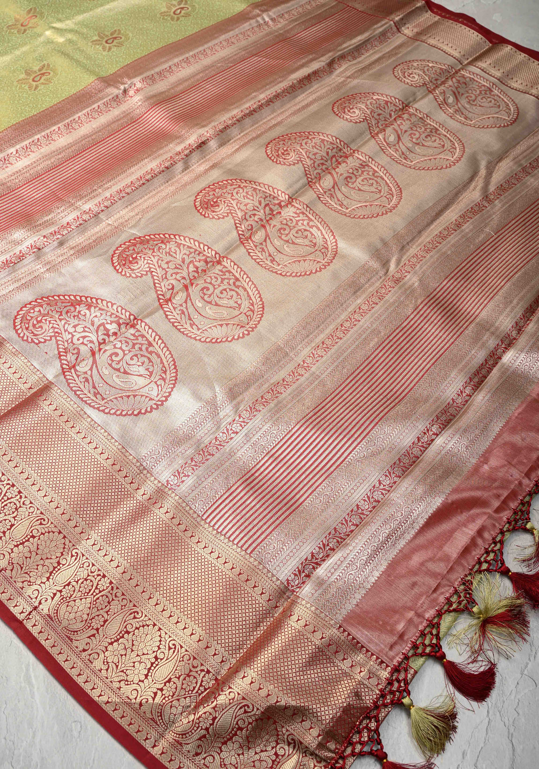Lemon Green  Brocade Jaal on Kanjivaram Tissue Semi Silk Saree with Meenakari Buttas and Contrast Zari Border
