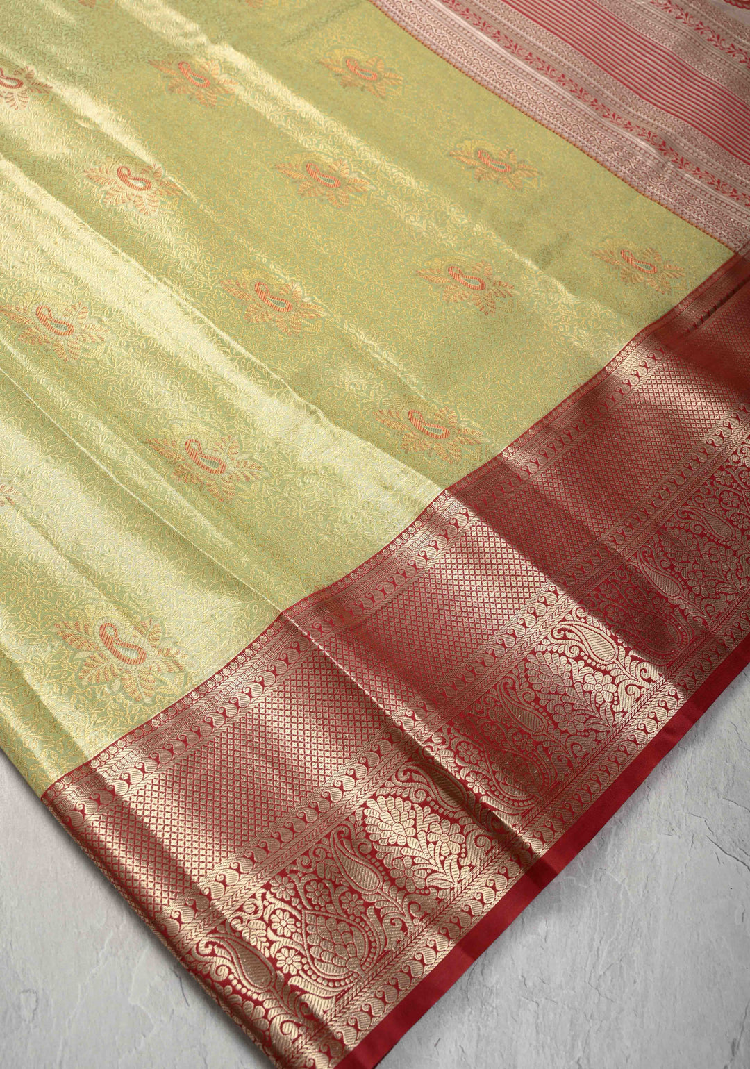 Lemon Green  Brocade Jaal on Kanjivaram Tissue Semi Silk Saree with Meenakari Buttas and Contrast Zari Border