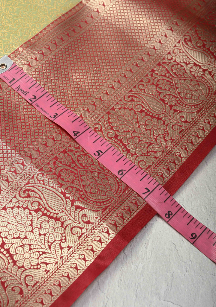 Lemon Green  Brocade Jaal on Kanjivaram Tissue Semi Silk Saree with Meenakari Buttas and Contrast Zari Border
