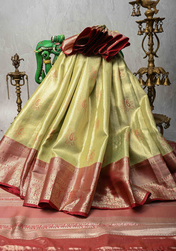 Lemon Green  Brocade Jaal on Kanjivaram Tissue Semi Silk Saree with Meenakari Buttas and Contrast Zari Border