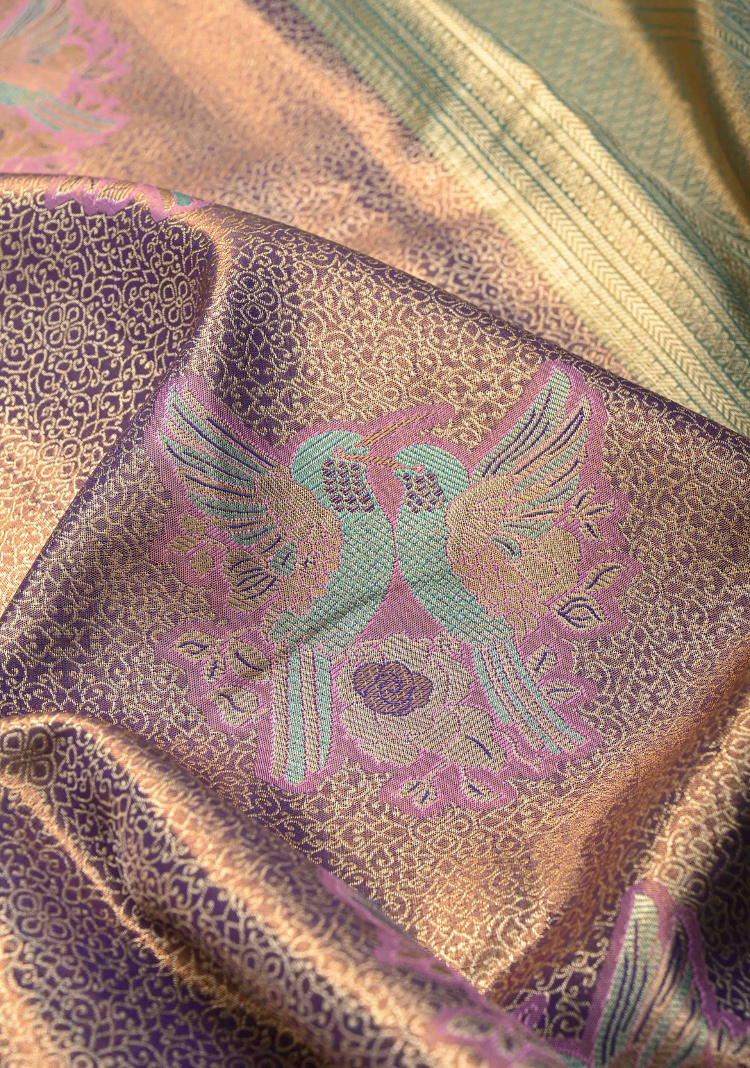 Purple Brocade Jaal on Kanjivaram Tissue Semi Silk Saree with Meenakari Twin Birds Buttas and Contrast Zari Border