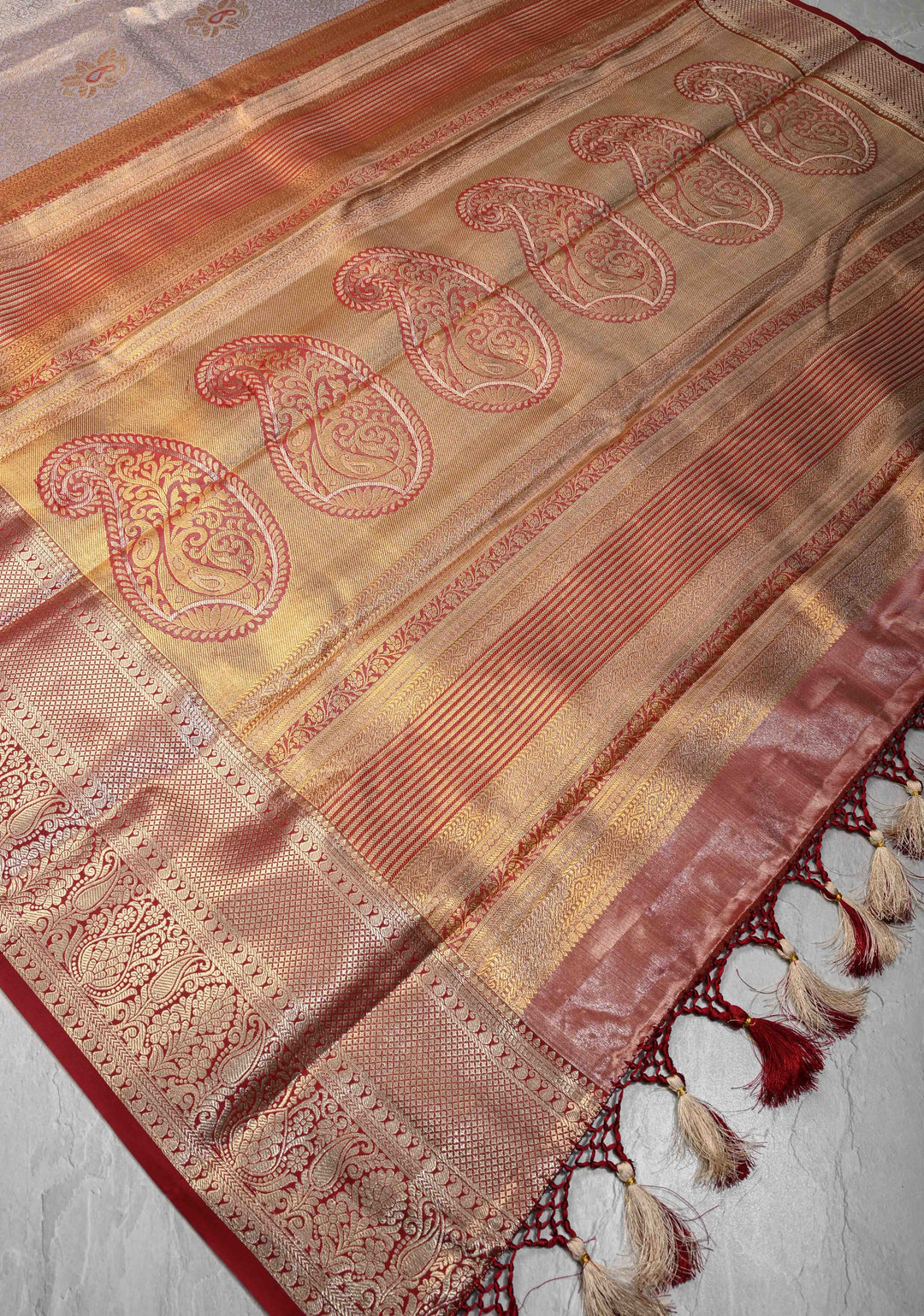 Brocade Gray Semi Silk Saree with Paisley Motifs and Zari Border