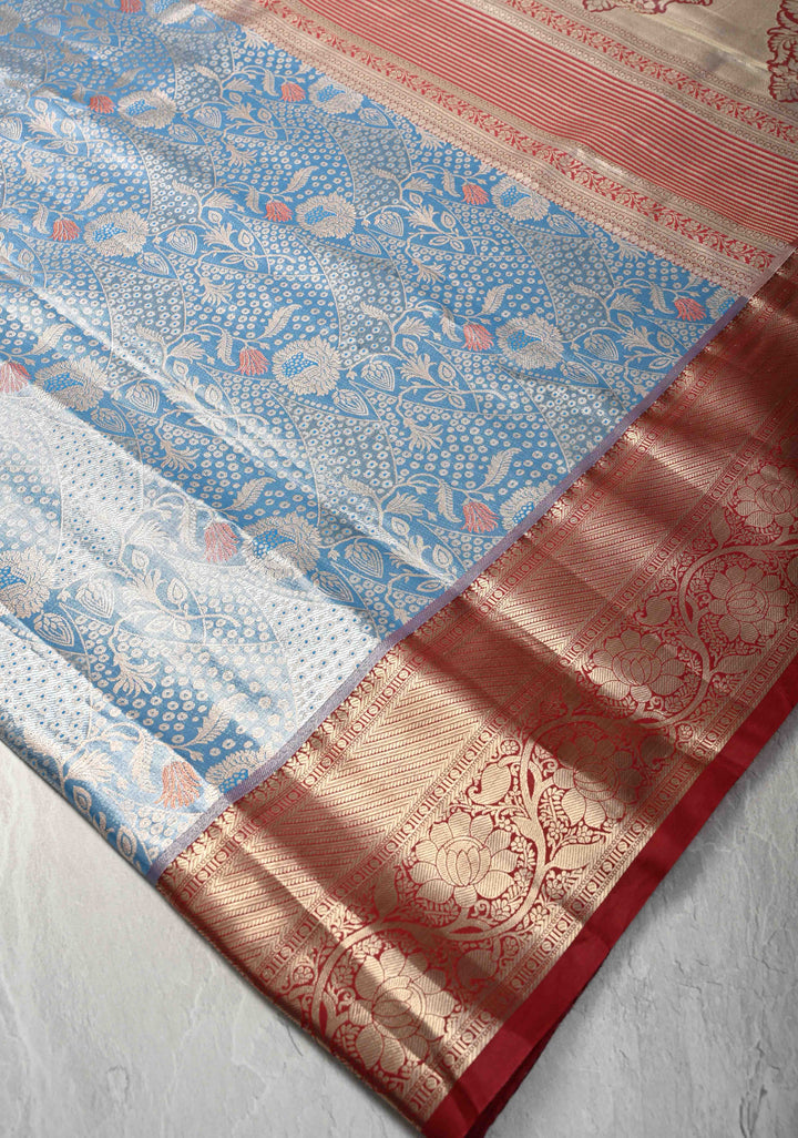 Azure Blue Floral Brocade on Kanjivaram Tissue Semi Silk Saree with Meenakari Buttas and Contrast Zari Border