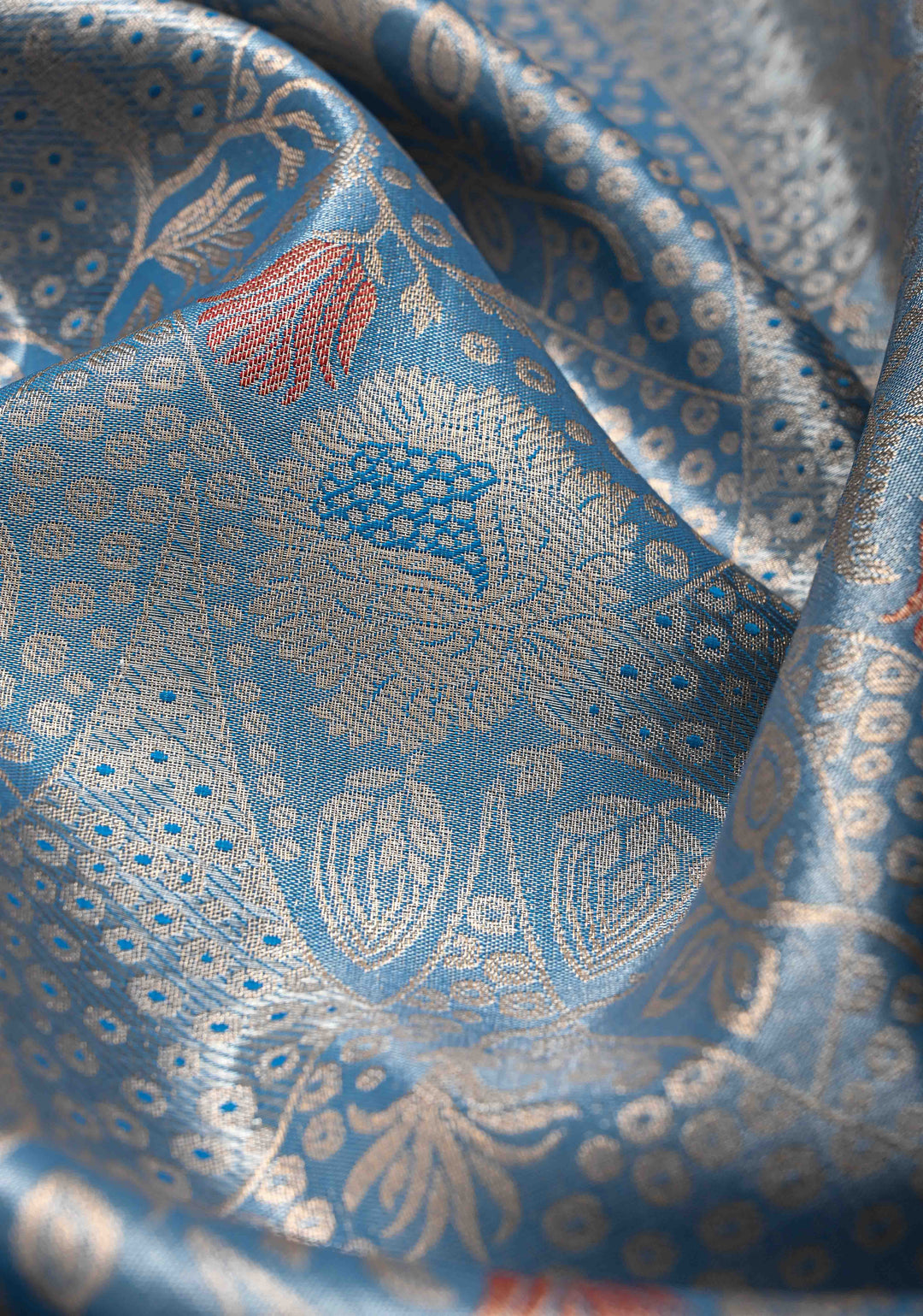 Azure Blue Floral Brocade on Kanjivaram Tissue Semi Silk Saree with Meenakari Buttas and Contrast Zari Border