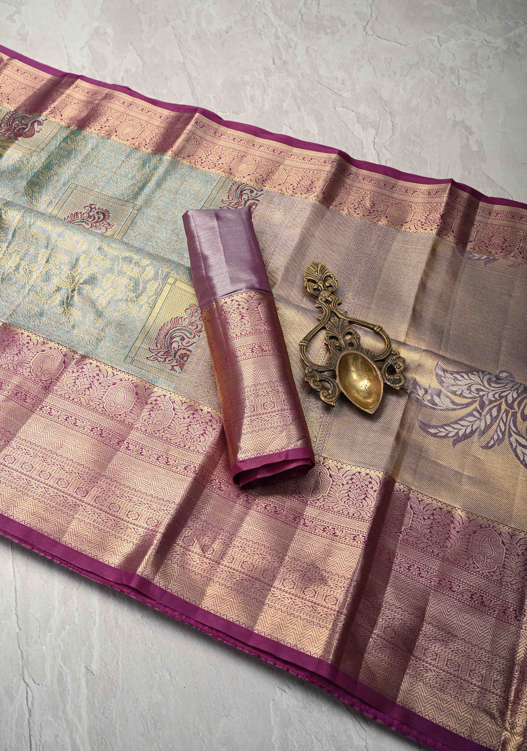 Teal Brocade Jaal on Kanjivaram Tissue Semi Silk Saree with Meenakari Peacock Buttas and Zari Border