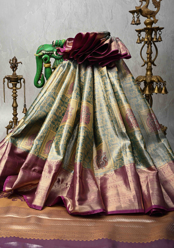 Teal Brocade Jaal on Kanjivaram Tissue Semi Silk Saree with Meenakari Peacock Buttas and Zari Border