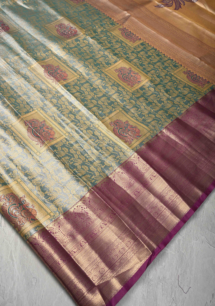 Teal Brocade Jaal on Kanjivaram Tissue Semi Silk Saree with Meenakari Peacock Buttas and Zari Border