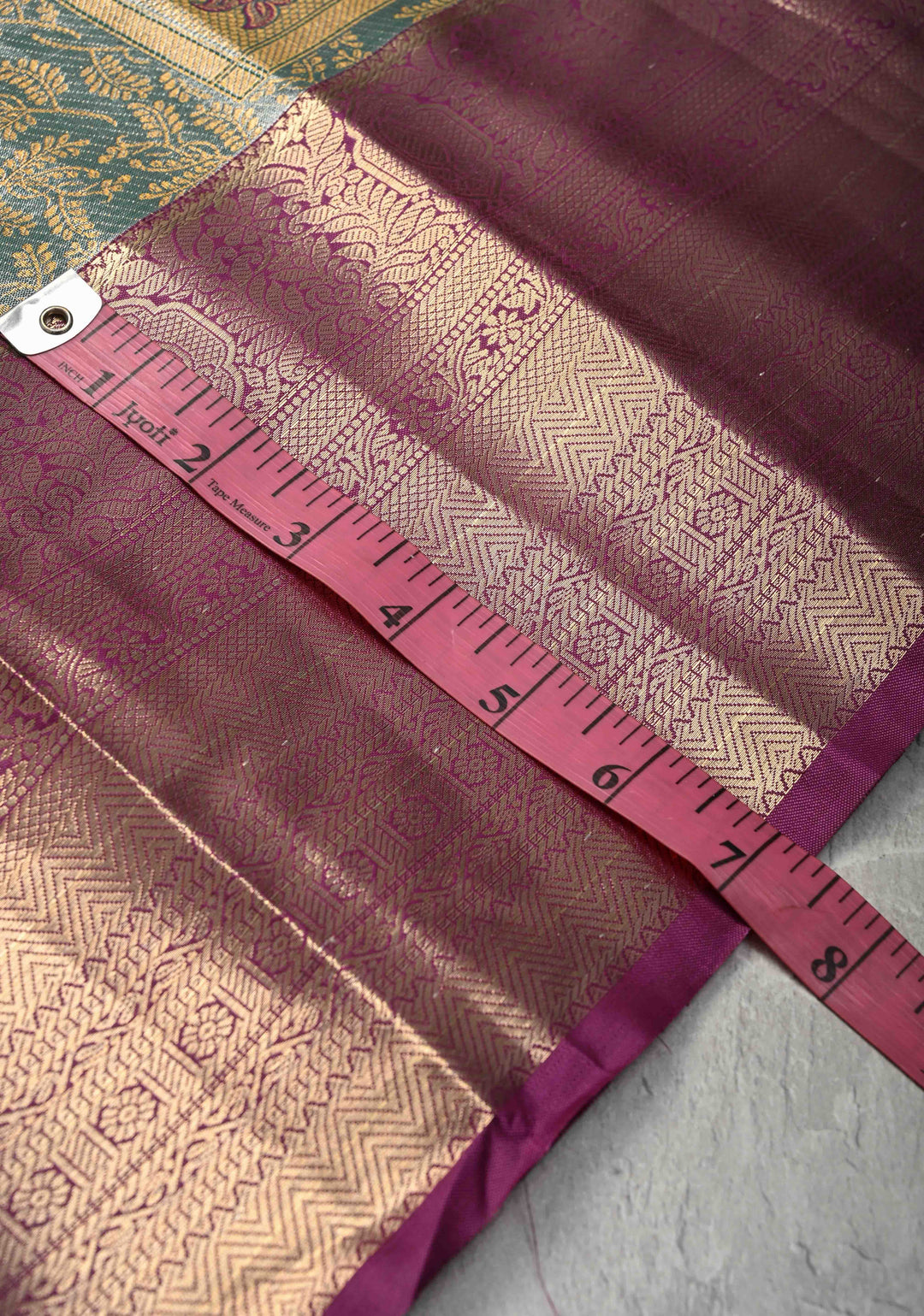 Teal Brocade Jaal on Kanjivaram Tissue Semi Silk Saree with Meenakari Peacock Buttas and Zari Border