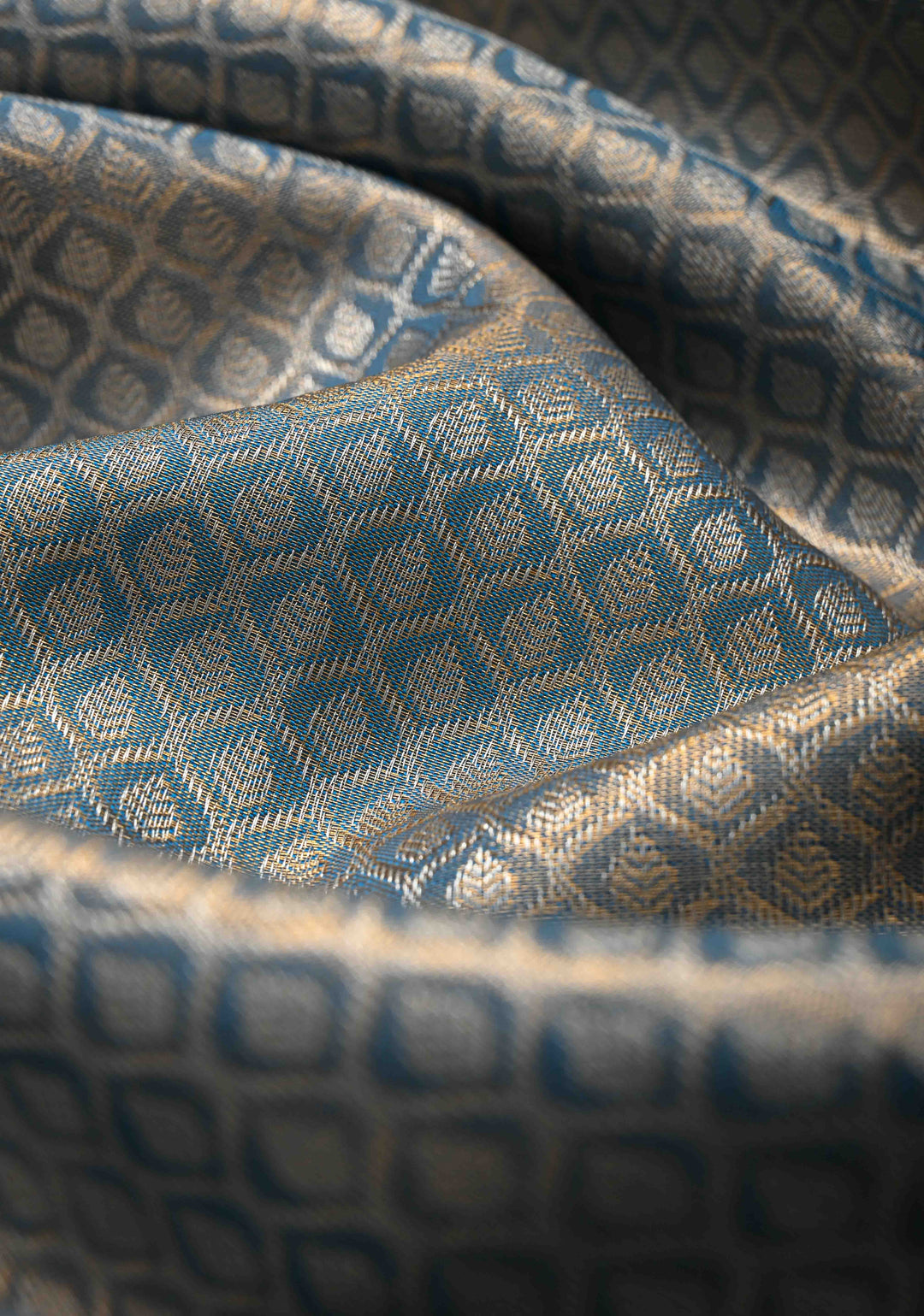Peacock Blue Brocade on Kanjivaram Tissue Semi Silk Saree with Contrast Zari Border