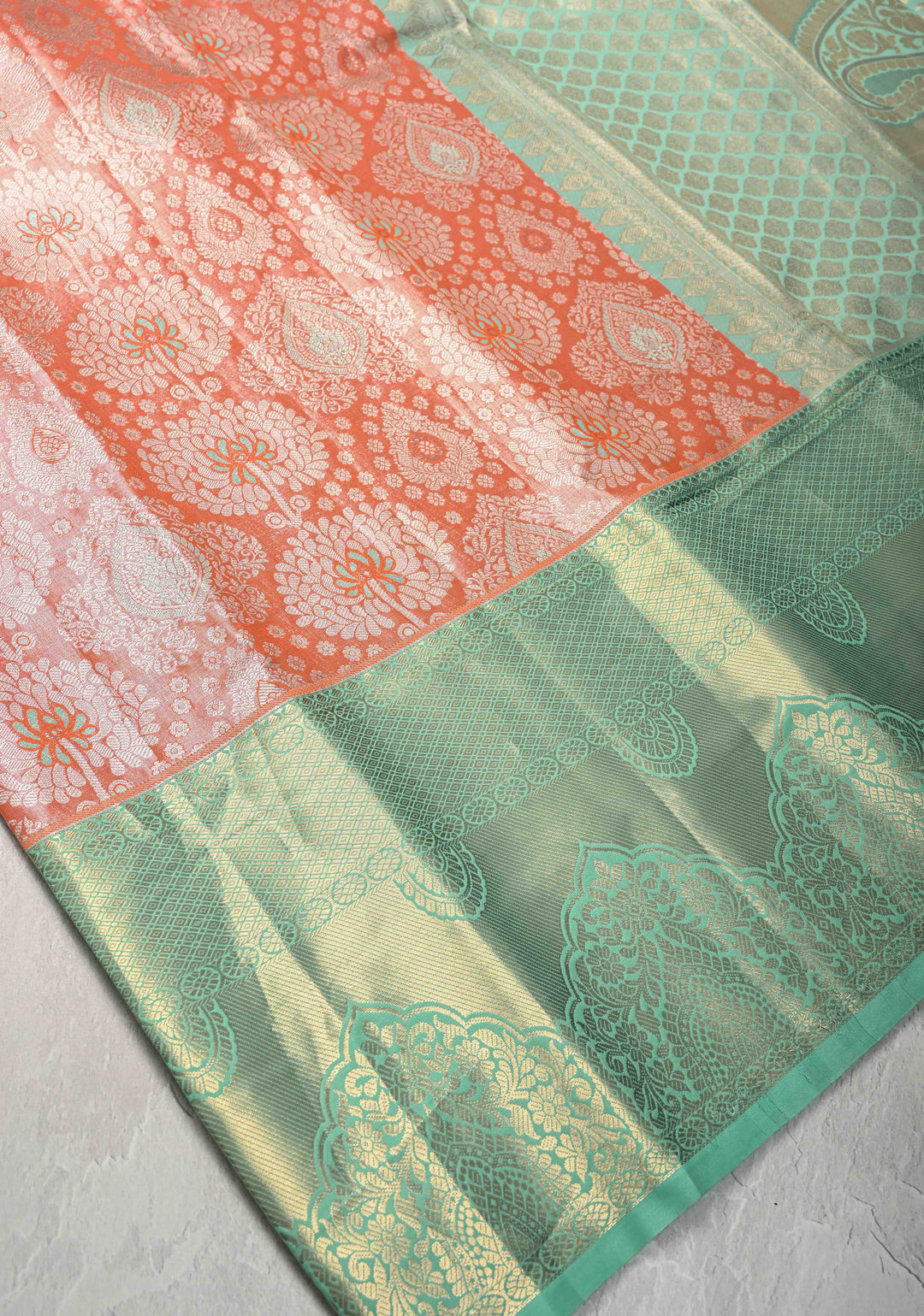 Orange Kanjivaram Tissue Semi Silk Saree with Meenakari Floral Brocade and Contrast Zari Border
