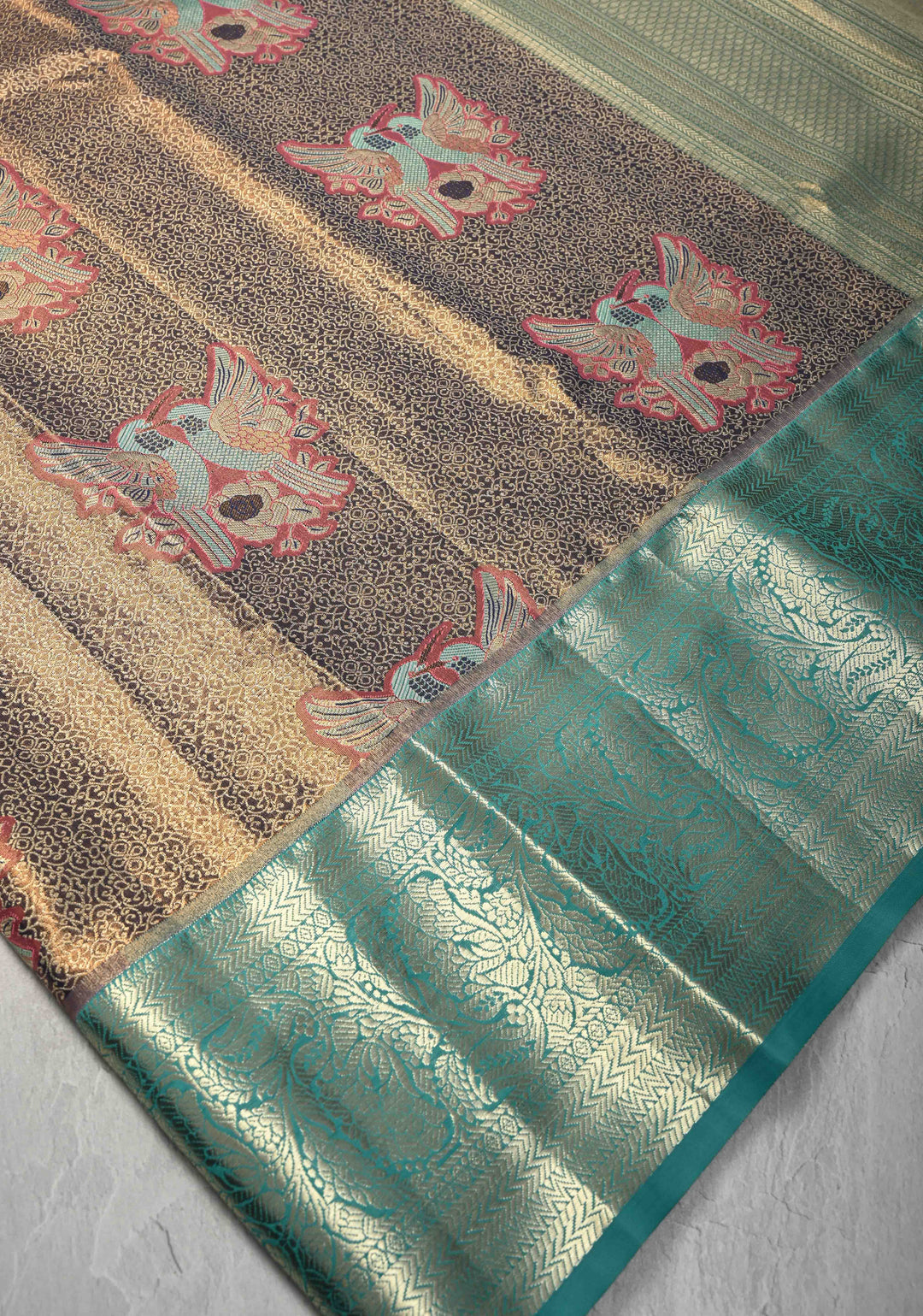 Blue Brocade Jaal on Kanjivaram Tissue Semi Silk Saree with Meenakari Twin Birds Buttas and Contrast Zari Border