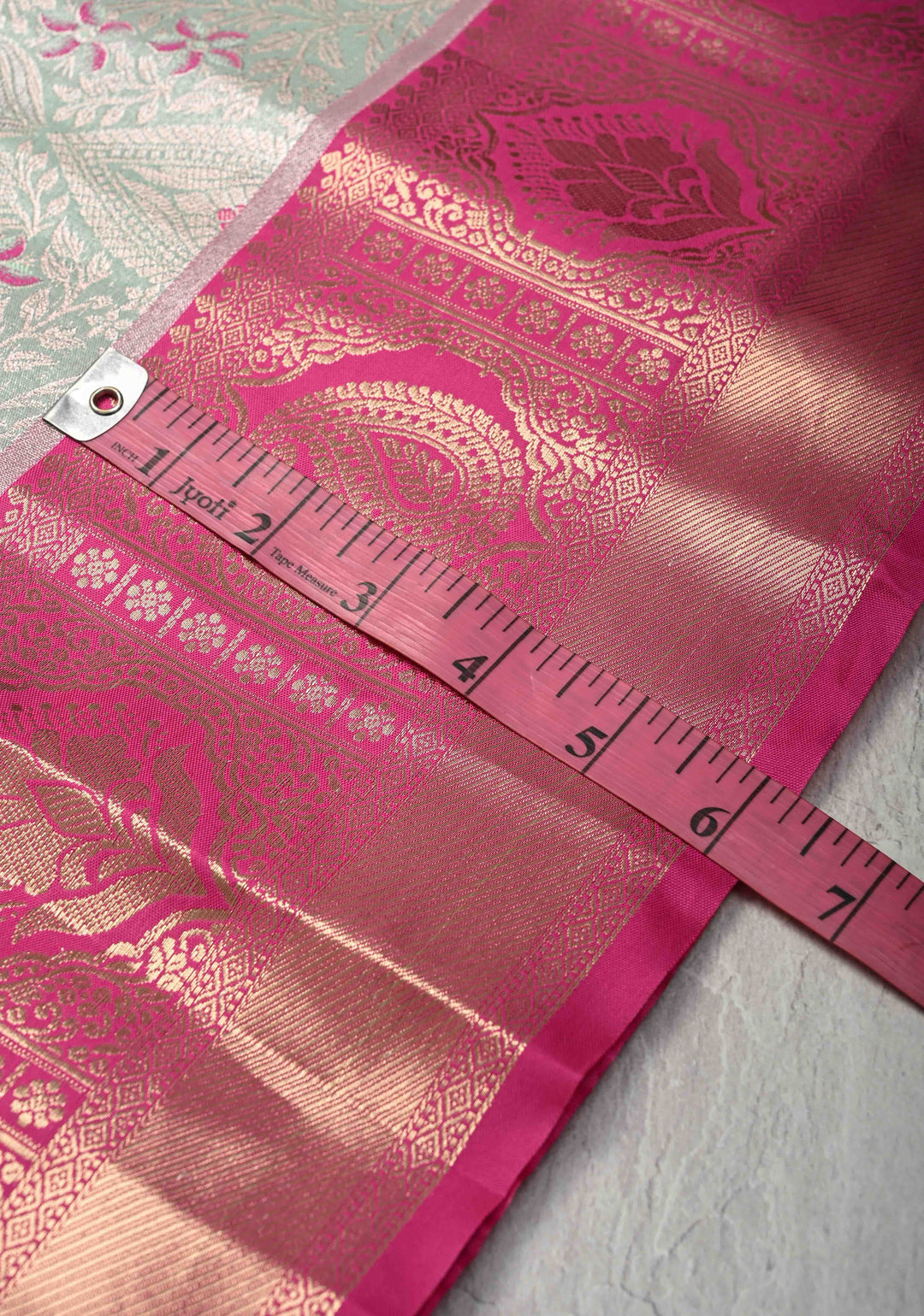 Sage Green Brocade on Kanjivaram Tissue Semi Silk Saree with Meenakari Buttas and Contrast Zari Border