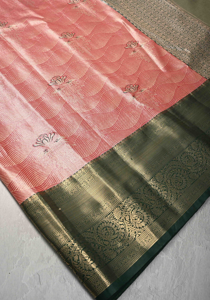 Salmon Brocade Jaal on Kanjivaram Tissue Semi Silk Saree with Meenakari Buttas and Contrast Zari Border