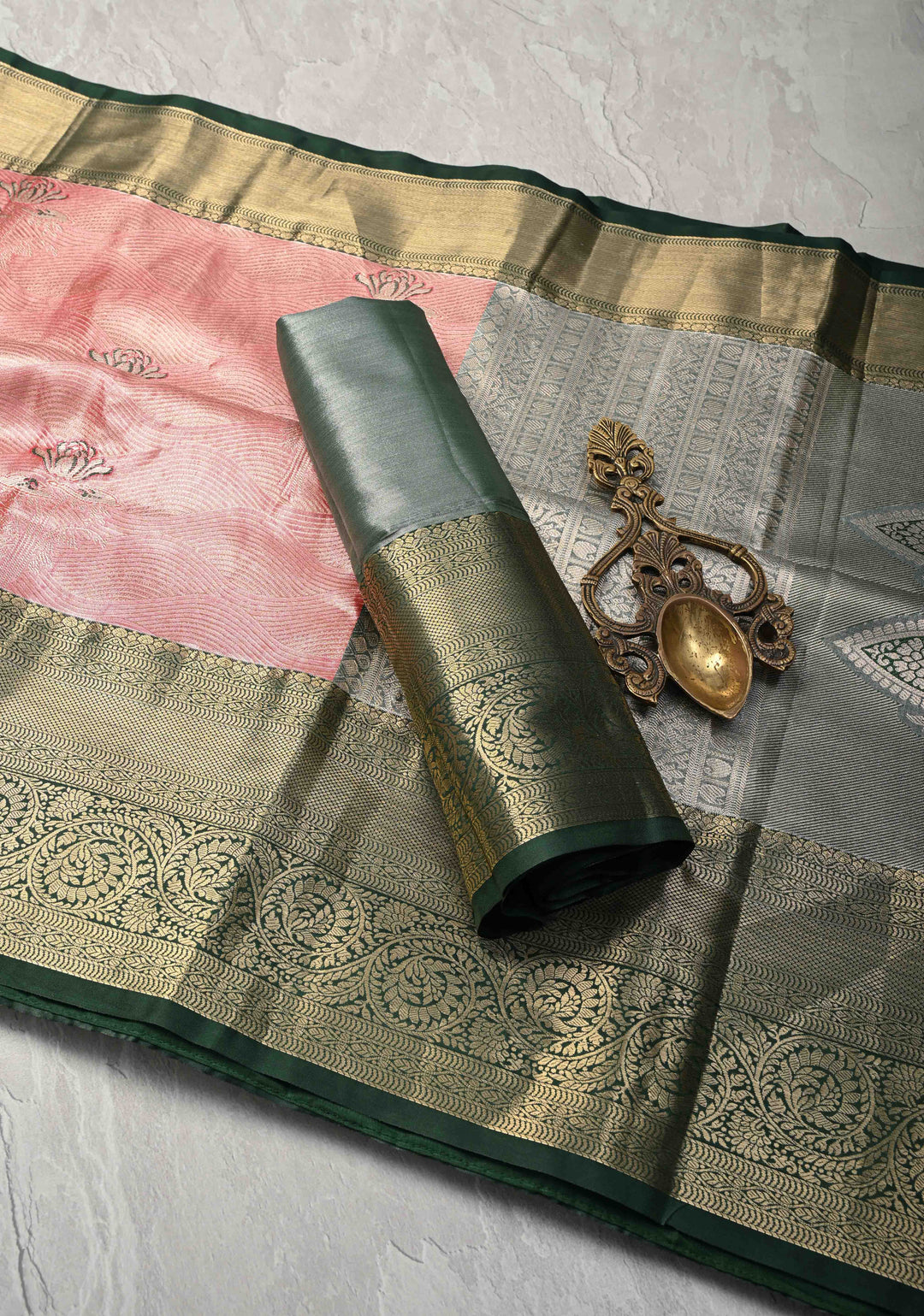 Salmon Brocade Jaal on Kanjivaram Tissue Semi Silk Saree with Meenakari Buttas and Contrast Zari Border