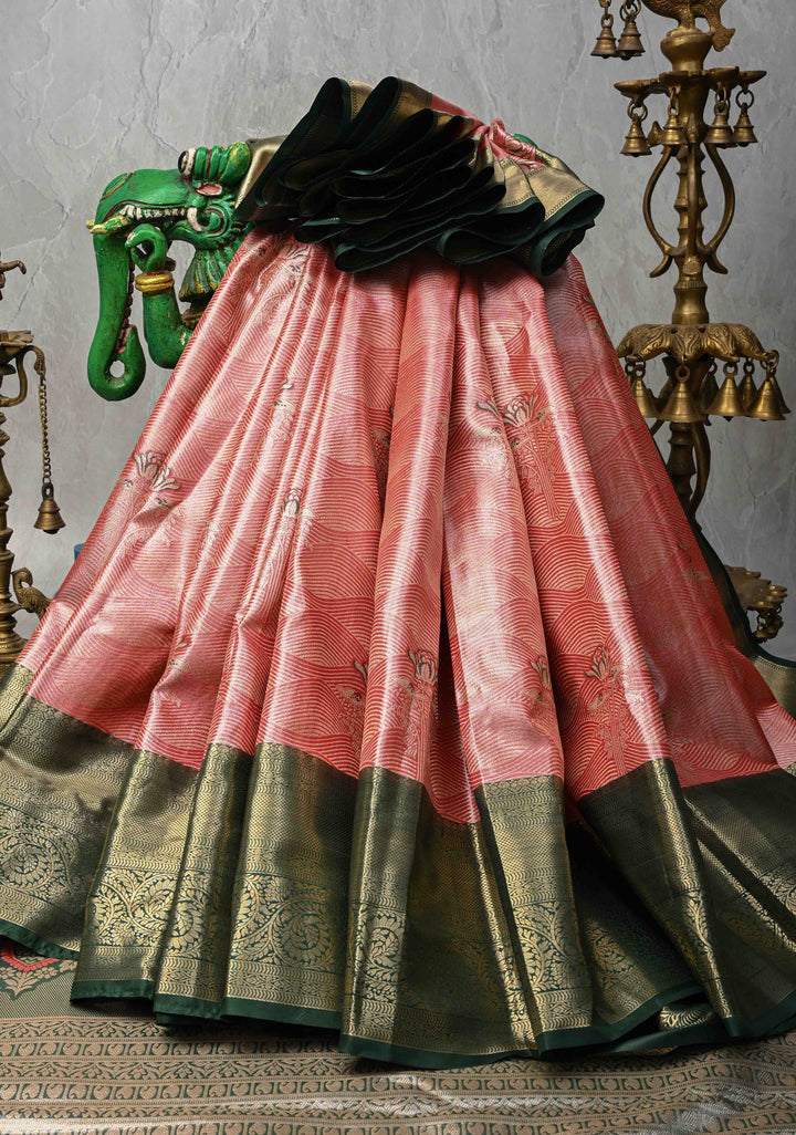 Salmon Brocade Jaal on Kanjivaram Tissue Semi Silk Saree with Meenakari Buttas and Contrast Zari Border