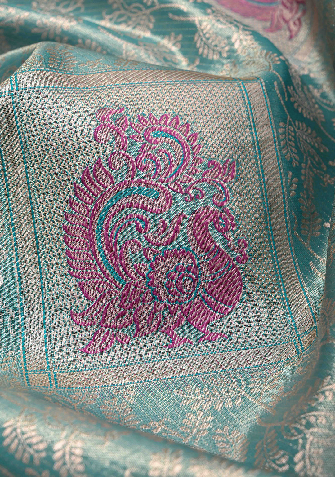Dusty Teal Floral Jaal on Kanjivaram Tissue Semi Silk Saree with Meenakari Buttas and Contrast Zari Border