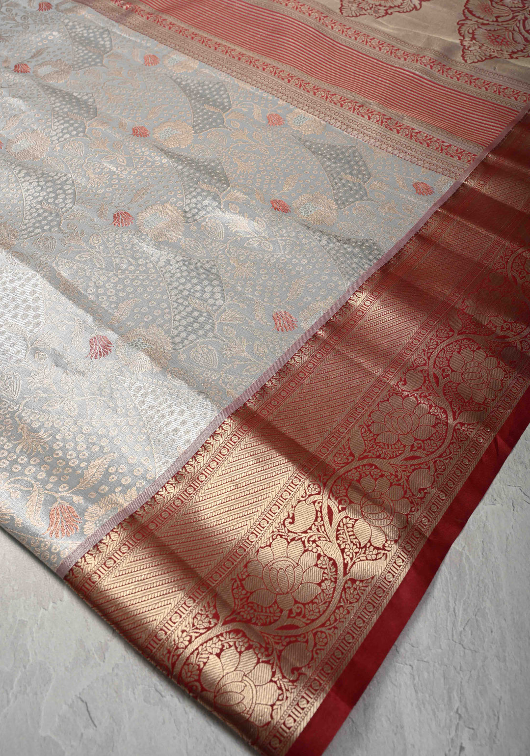 Gray Brocade on Kanjivaram Tissue Semi Silk Saree with Meenakari Buttas and Contrast Zari Border