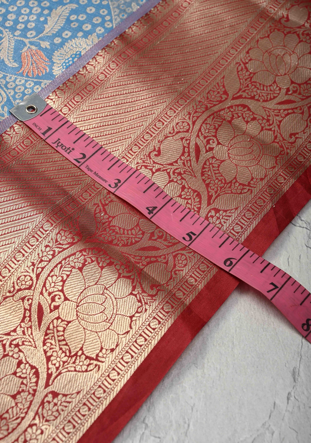 Azure Blue Kanjivaram Tissue Semi Silk Saree with Meenakari Floral Brocade and Contrast Zari Border
