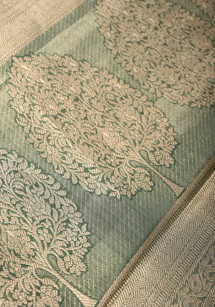 Faded Pink Brocade on Kanjivaram Tissue Semi Silk Saree with Meenakari Buttas and Contrast Zari Border
