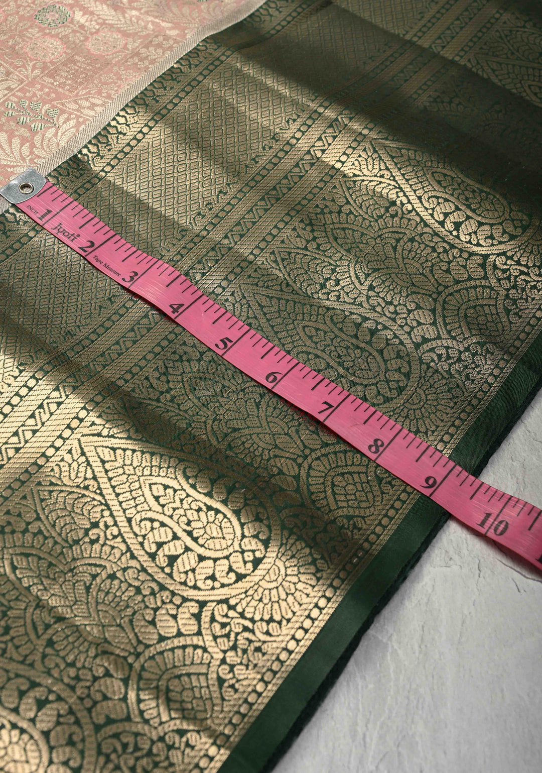 Faded Pink Brocade on Kanjivaram Tissue Semi Silk Saree with Meenakari Buttas and Contrast Zari Border