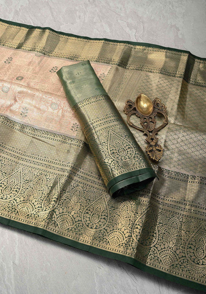 Faded Pink Brocade on Kanjivaram Tissue Semi Silk Saree with Meenakari Buttas and Contrast Zari Border