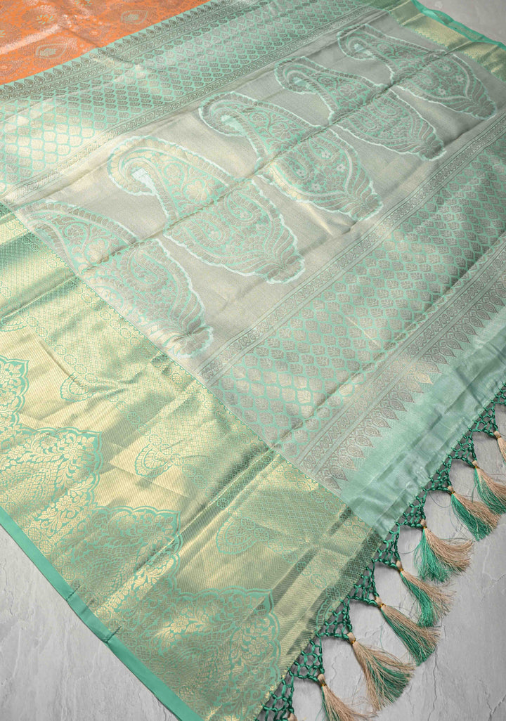 Orange Brocade on Kanjivaram Tissue Semi Silk Saree with Meenakari Buttas and Contrast Wide Zari Border