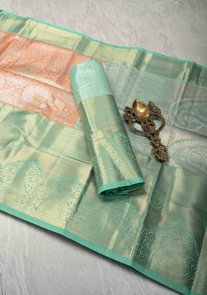 Orange Brocade on Kanjivaram Tissue Semi Silk Saree with Meenakari Buttas and Contrast Wide Zari Border