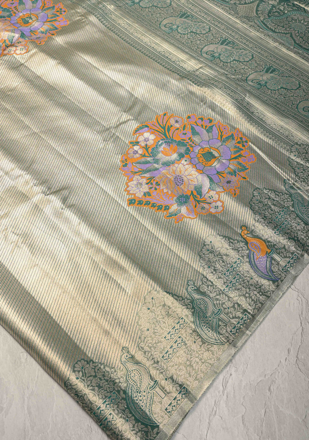 Gold-Blue Kanjivaram Tissue Semi Silk Saree with Meenakari Buttas and Peacock Scallop Border