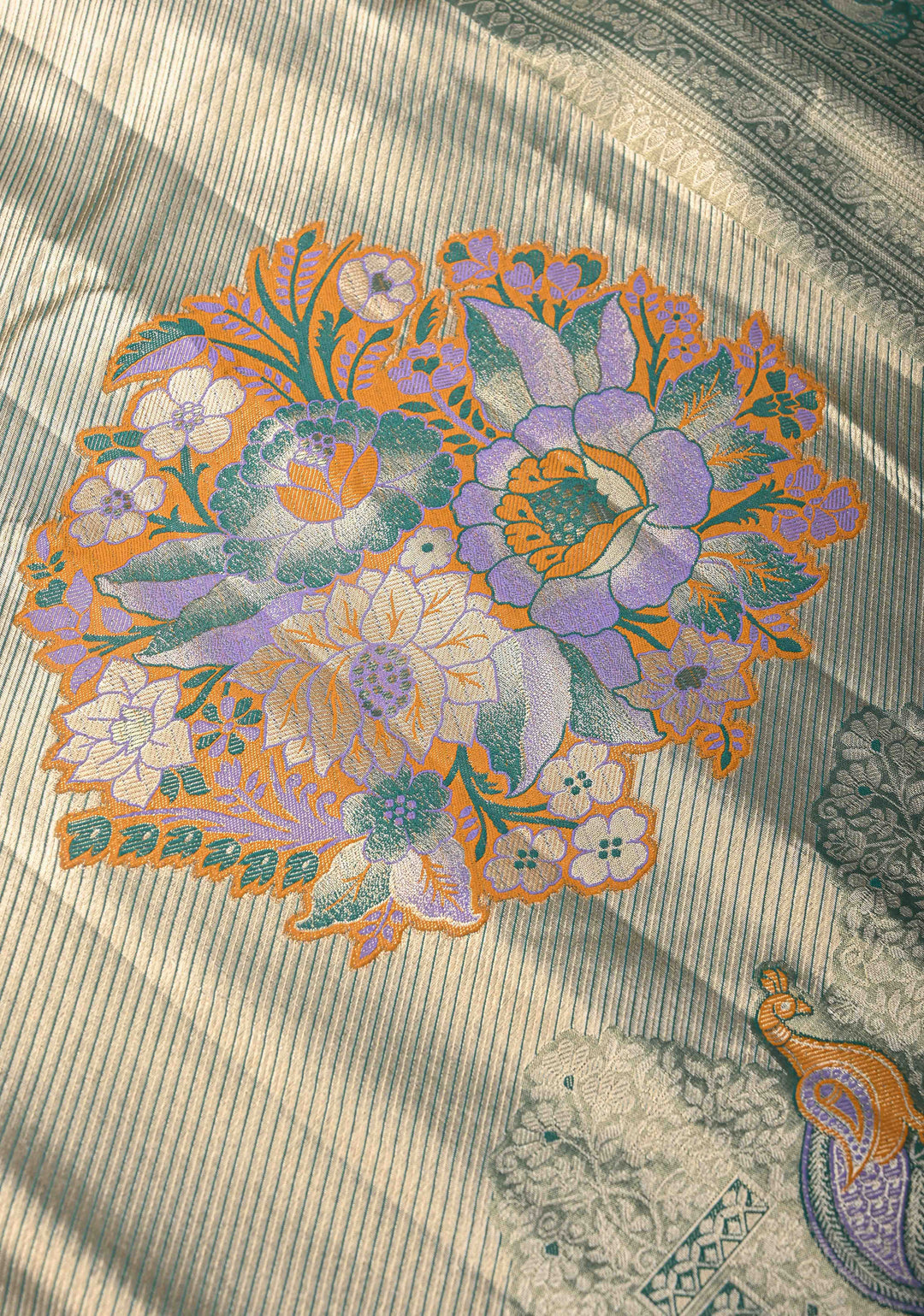 Gold-Blue Kanjivaram Tissue Semi Silk Saree with Meenakari Buttas and Peacock Scallop Border