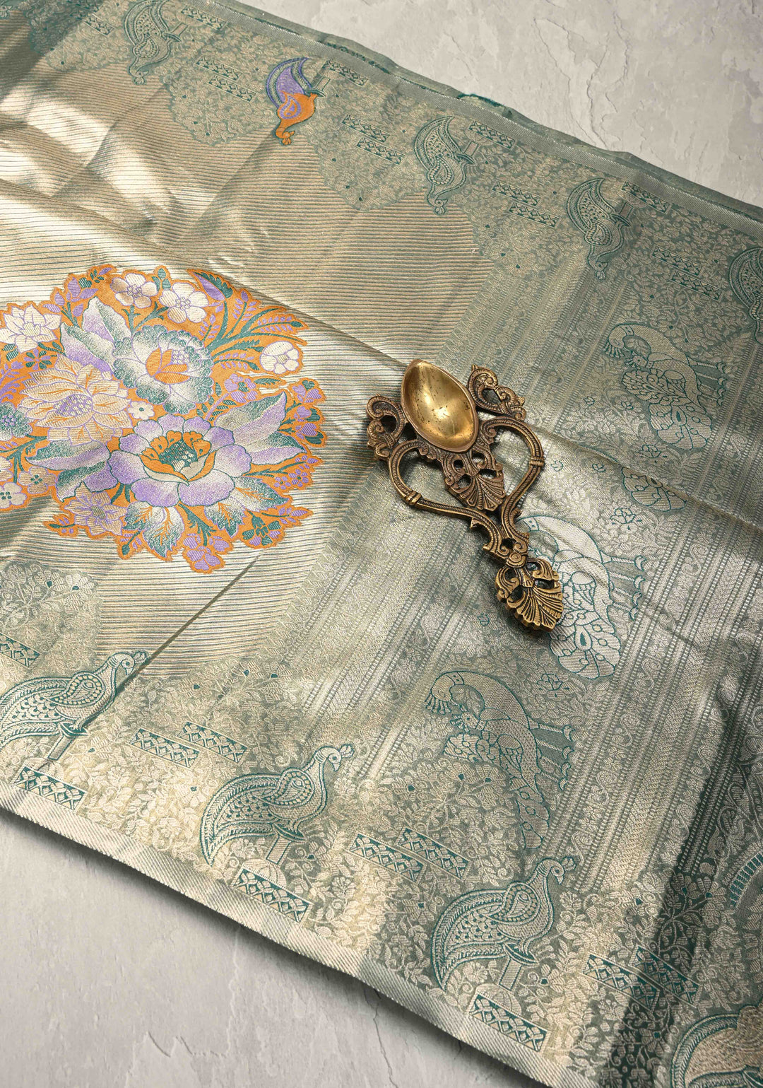 Gold-Blue Kanjivaram Tissue Semi Silk Saree with Meenakari Buttas and Peacock Scallop Border