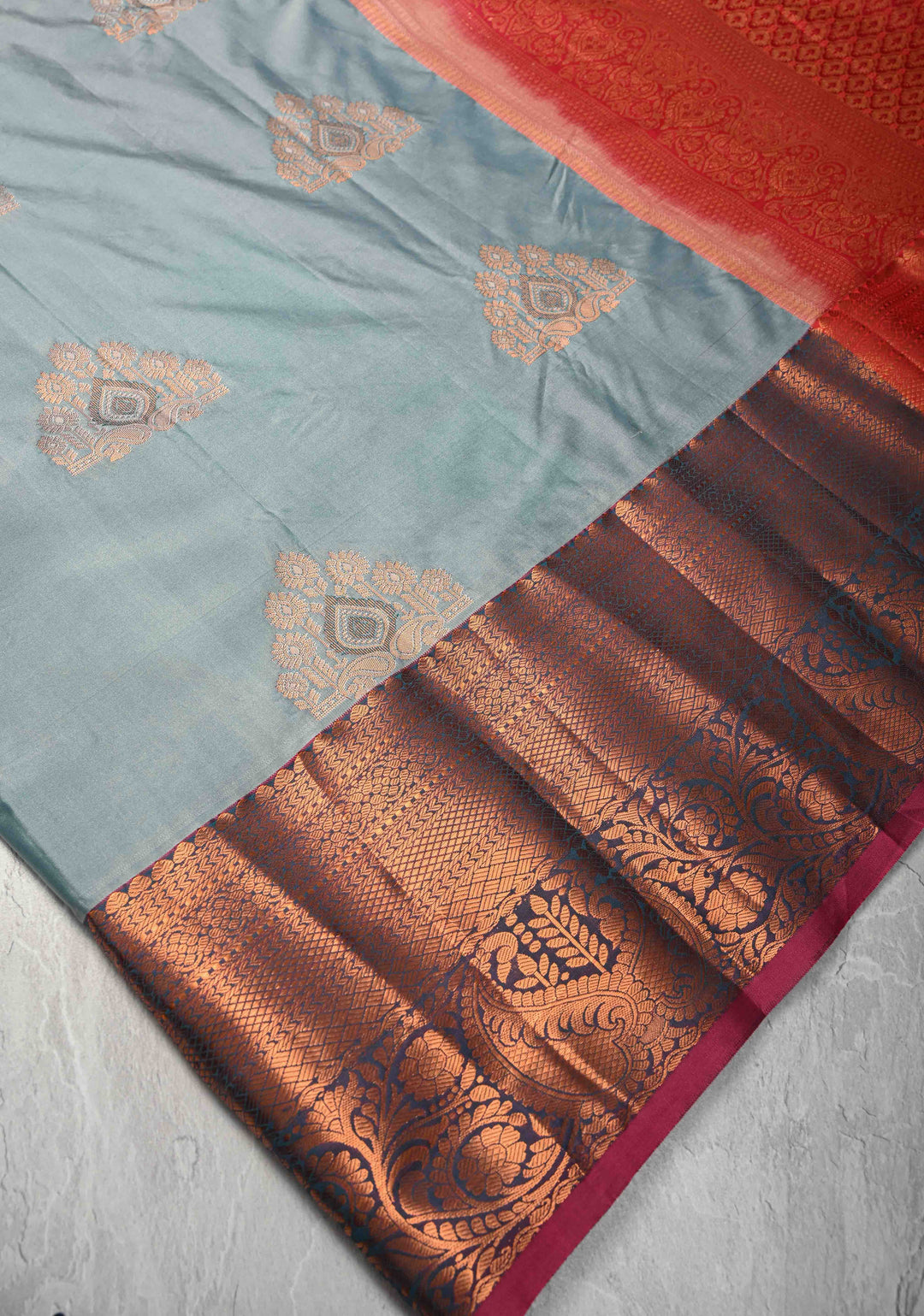 Frosty blue  Kanjivaram Semi Silk Saree with Meenakari Buttas and Contrast Zari Border