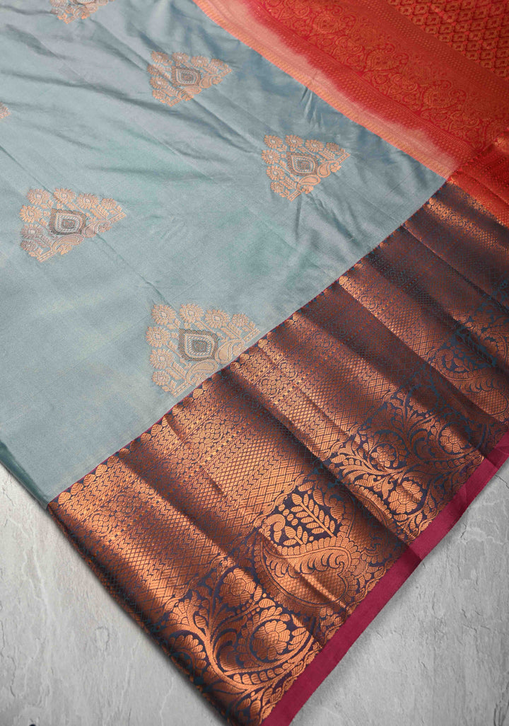 Frosty blue  Kanjivaram Semi Silk Saree with Meenakari Buttas and Contrast Zari Border