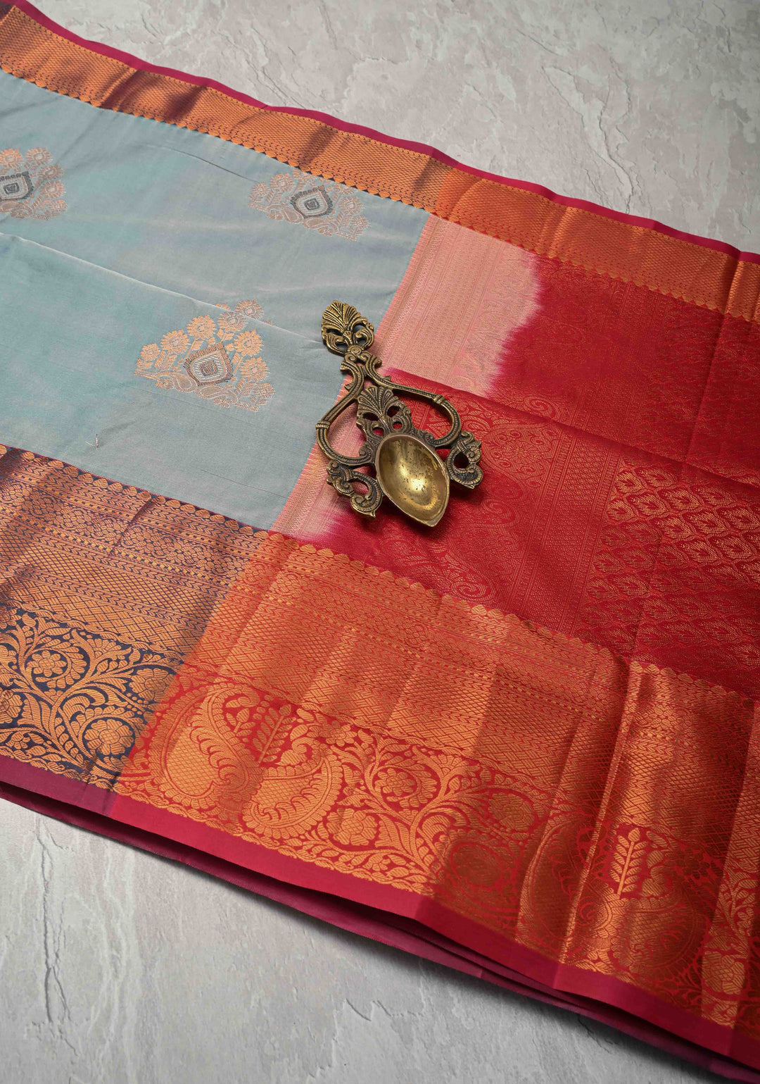 Frosty blue  Kanjivaram Semi Silk Saree with Meenakari Buttas and Contrast Zari Border
