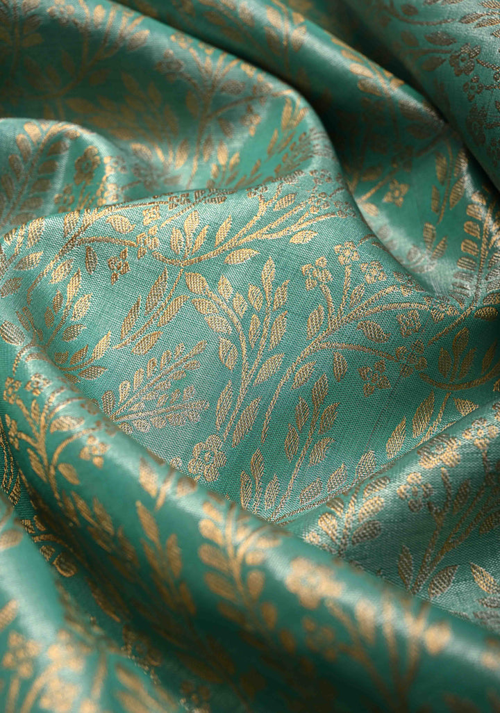 Spring Green Kanjivaram Floral Brocade Tissue Semi Silk Saree With Contrast Meenakari Zari Border