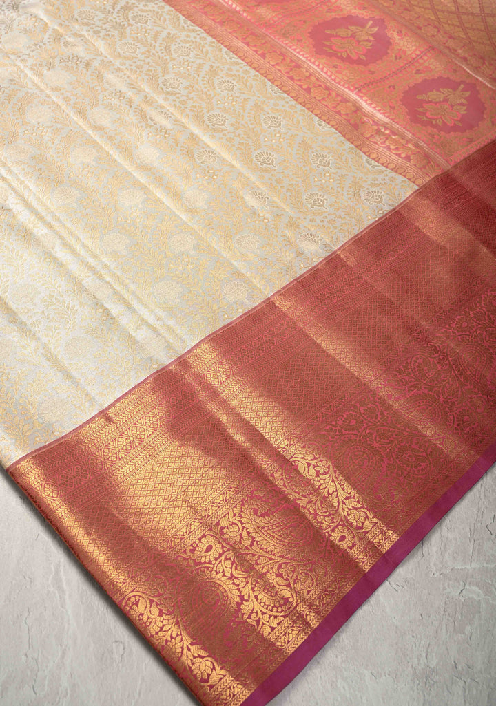 Pearl White Kanjivaram Tissue Semi Silk Saree with Floral Brocade Jaal and Contrast Zari Border