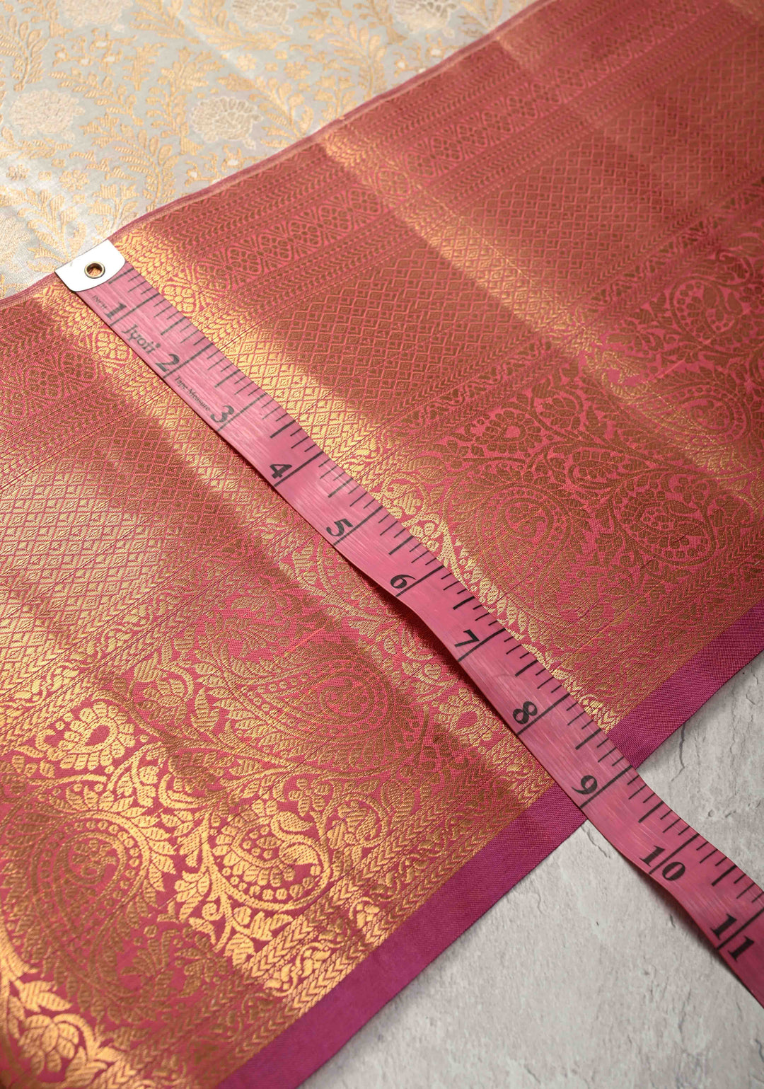 Pearl White Kanjivaram Tissue Semi Silk Saree with Floral Brocade Jaal and Contrast Zari Border